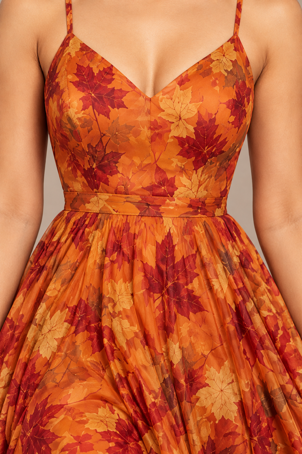 Close-up of leaf-print frock neckline, bodice and waist