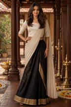 Kritzy Celebration ivory draped blouse with black and antique-gold festive lehenga