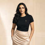 Muze wearing the Kritzy Midnight black fitted T-shirt with gold monogram