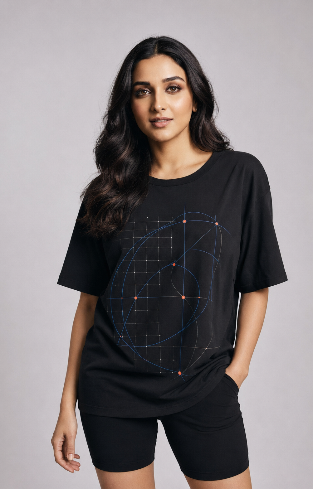 Muze wearing the Kritzy Orbit Grid black geometric T-shirt