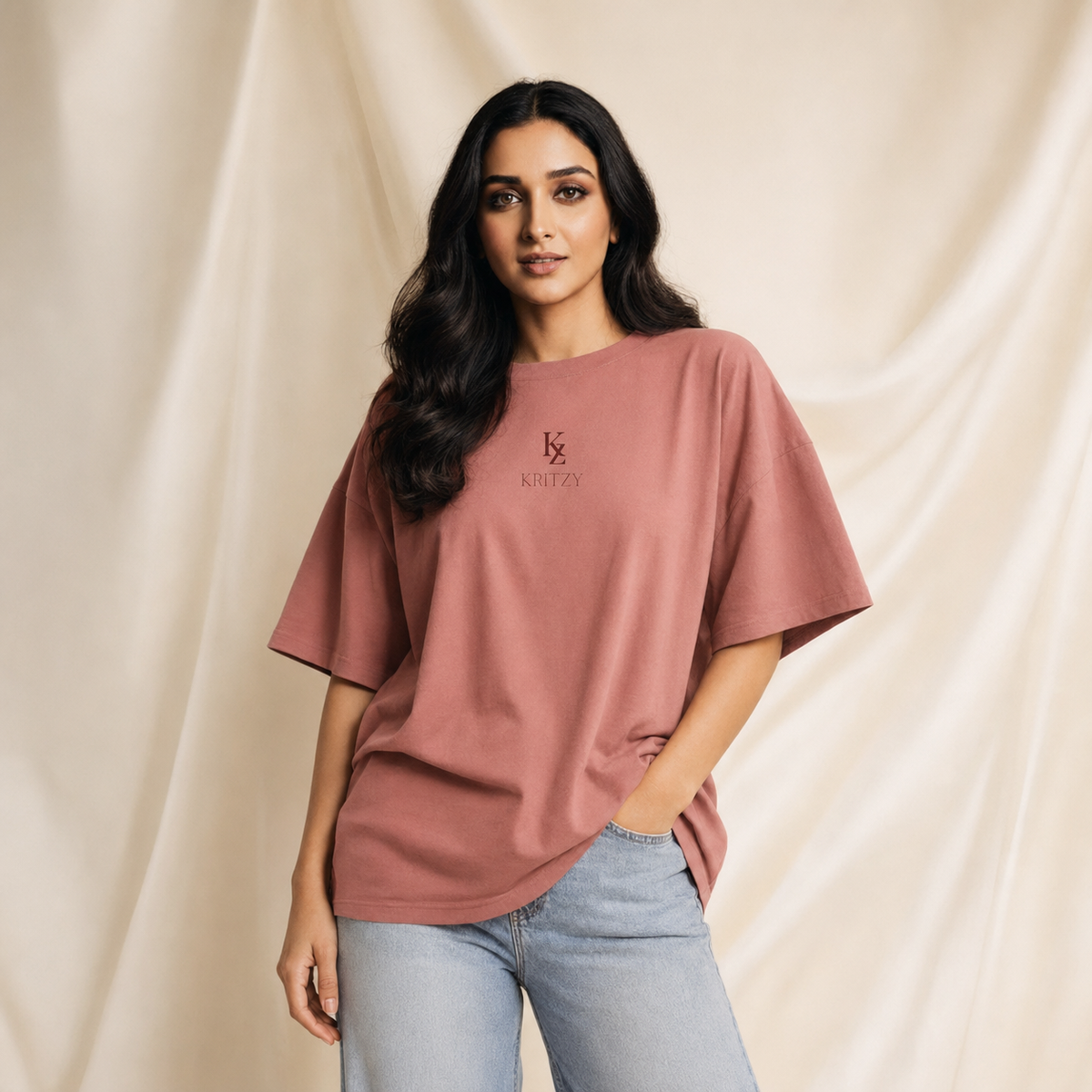 Muze wearing the Kritzy Rose dusty-rose oversized T-shirt